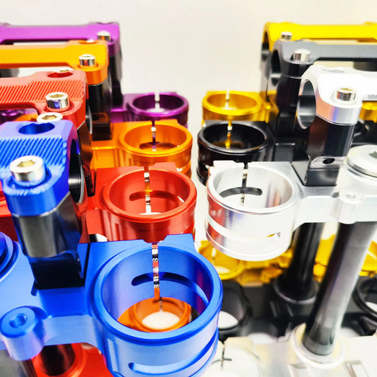 SURRON ULTRA BEE fork top and bottom triple clamps parts mod fork top and bottom UB triple clamps RISE DEFENSE SYSTEMS.AI PRODUCTS